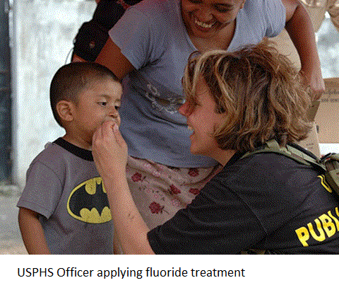 USPHS Officer Applying Fluoride