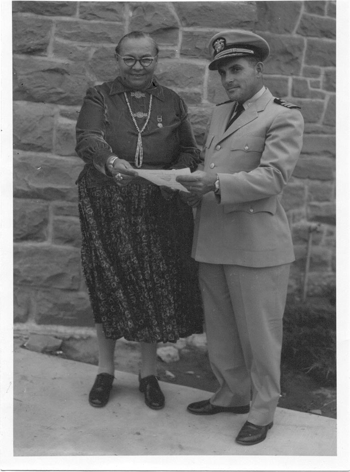 RADM John Todd in uniform standing with Dr. Annie Wauneka