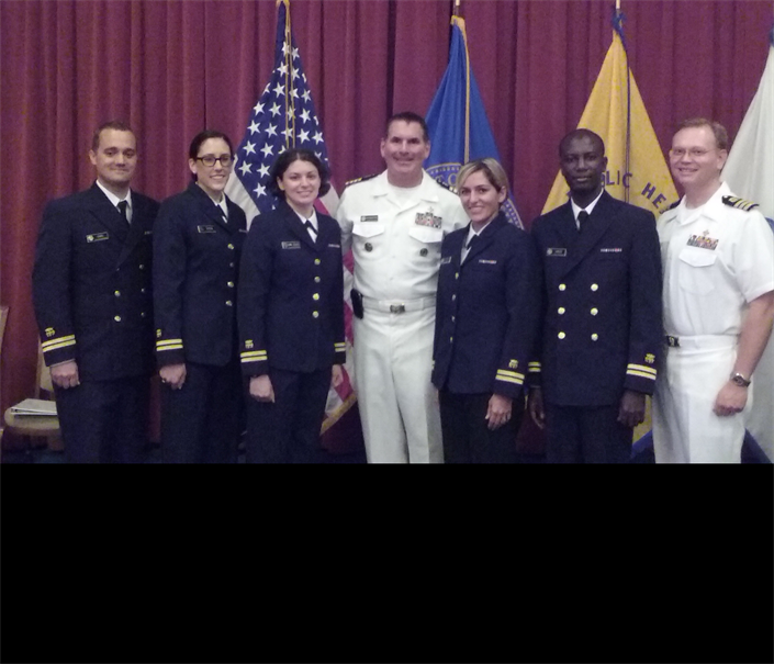 OBC Class 90 (Aug 2016) From left to right: OBC Graduates LT William Davis, LT Samantha DiMisa and LT Ruth Link-Gelles, CAPT Martin Sanders, OBC Gradautes LT Hilda Razzaghi and LT Francis Annor, and CDR Arlin Hatch